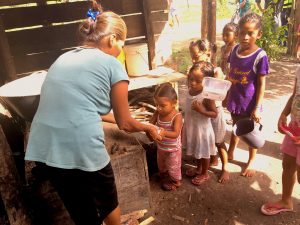 Serving food in Rio Coco